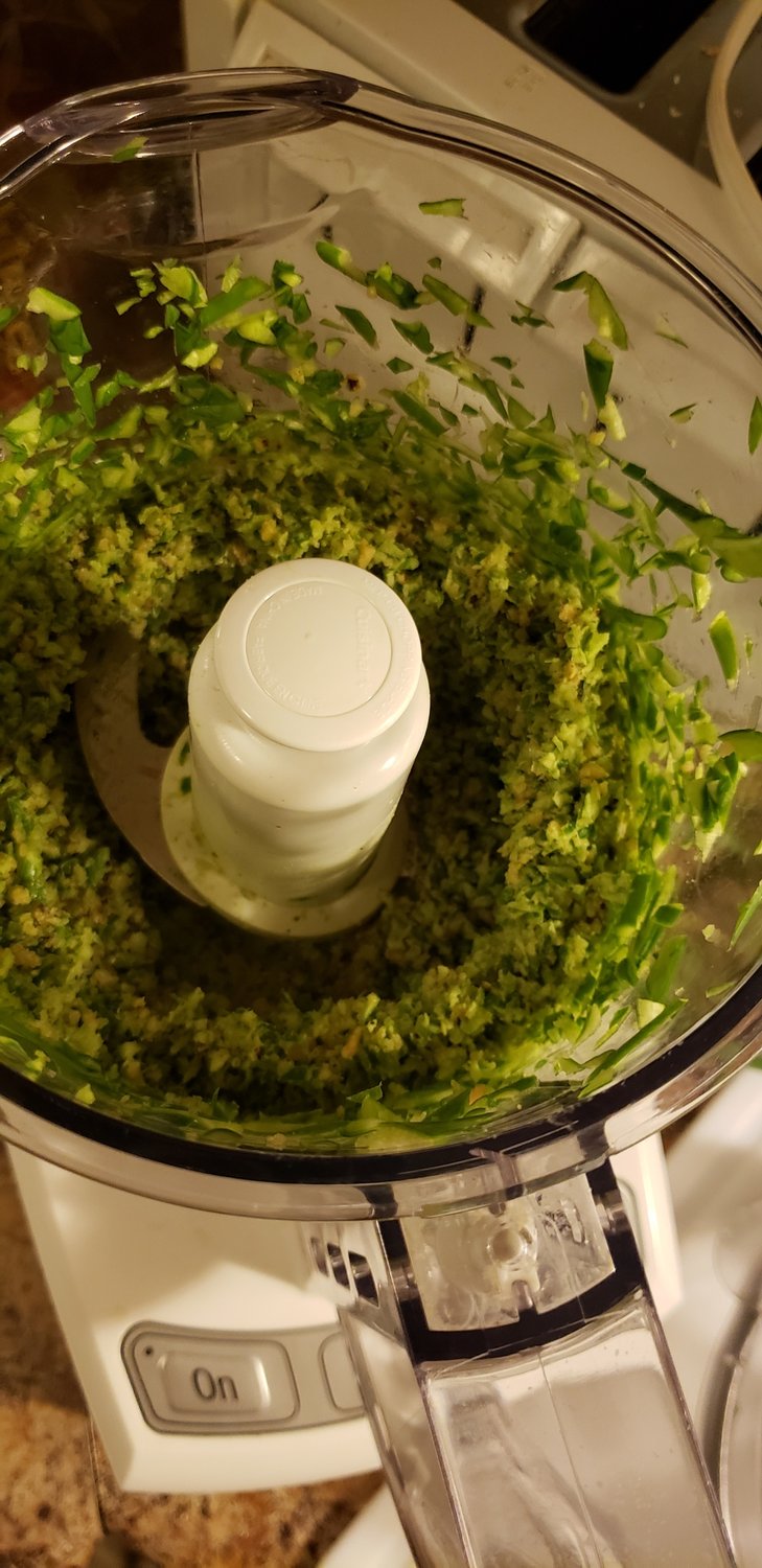 It’s important to regularly check the consistency of your pesto as you bring it together into a creamy green delight.